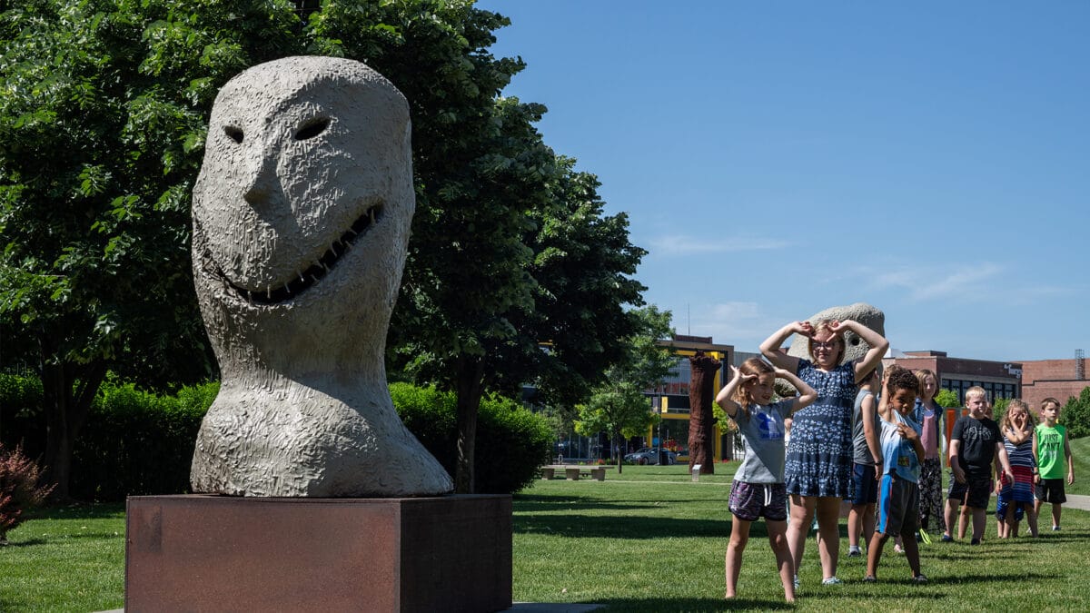 Kids playing in the Pappajohn Sculpture Park