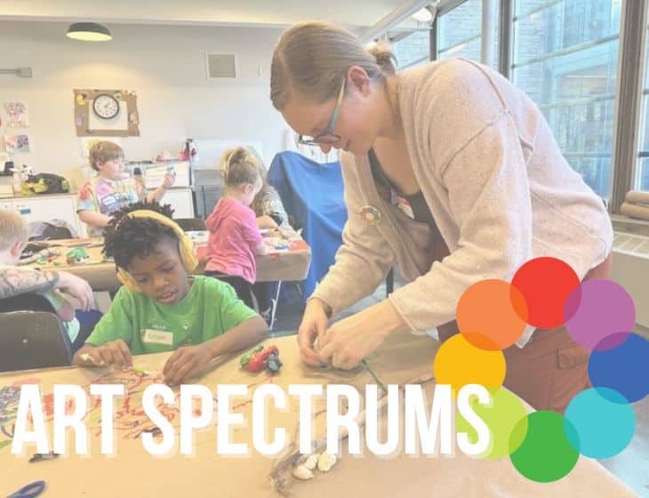 Background image of an adult helping a child put together an art project. Child is wearing over-the-ear headphones. White lettering - "Art Spectrums" with rainbow color wheel.