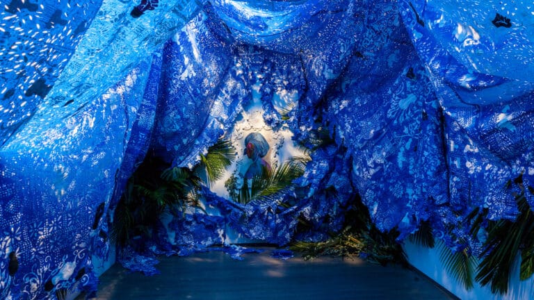 Firelei Báez (Dominican, born 1981) roots when they are young and most tender, 2018 (detail) Mixed-media installation; two paintings, hand painted papier-mâché sculptures, hand painted tarp, chicken wire and foliage