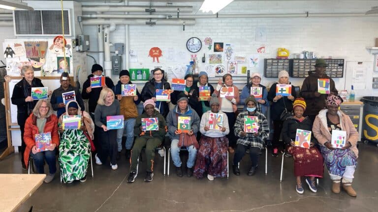 large group pic with collages led by Micah Ferrin
