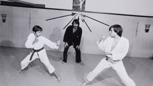 Bill Owens (American, born 1938) Karate is a highly competitive sport, like tennis or boxing. It’s on one. For $30 a month a kid can get some good mental and physical training. He can learn coordination, balance, timing and self-defense. Livermore, California, from the "Leisure" series, 1974 (printed 1999) Gelatin silver print Des Moines Art Center Permanent Collections: The Jeff Perry Photography Collection given in honor of Myron and Jacqueline Blank, 2024.120