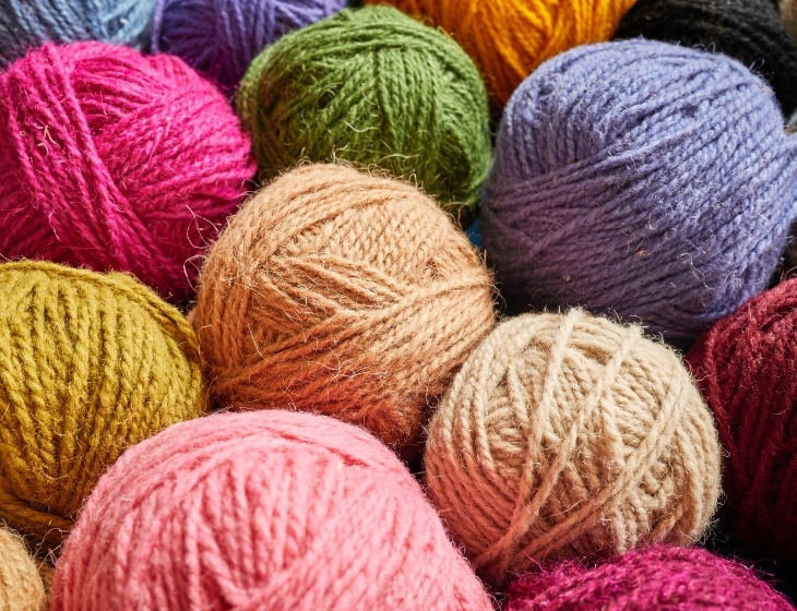 spools of wool yarn in varying colors