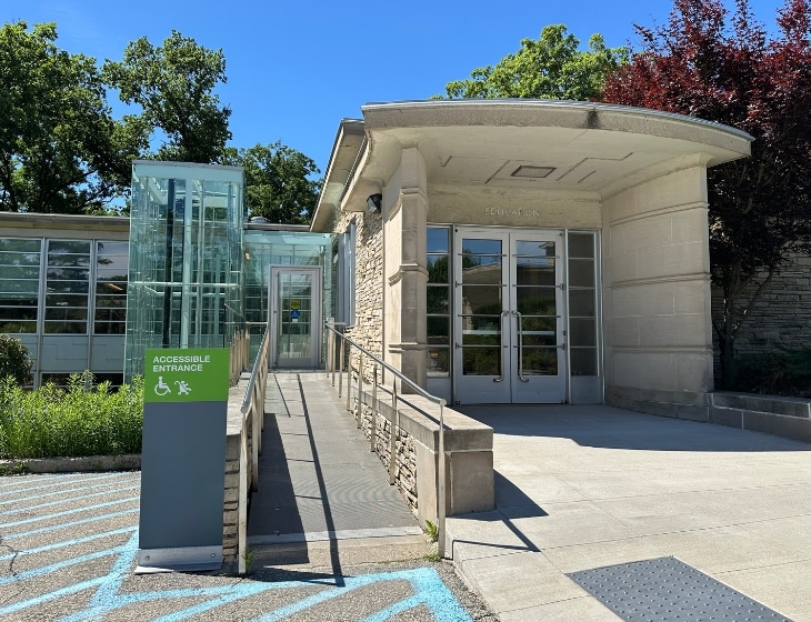 The Education and Accessible ramp entrance to the Des Moines Art Center - South of the main entrance. The ramp is left of the double door entrance.